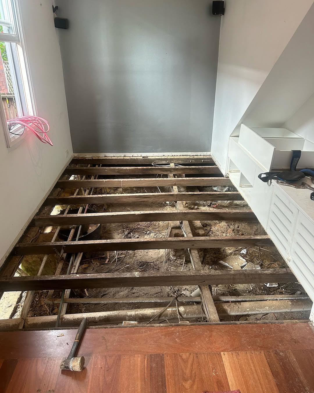 A room without floorboards ready for new installation